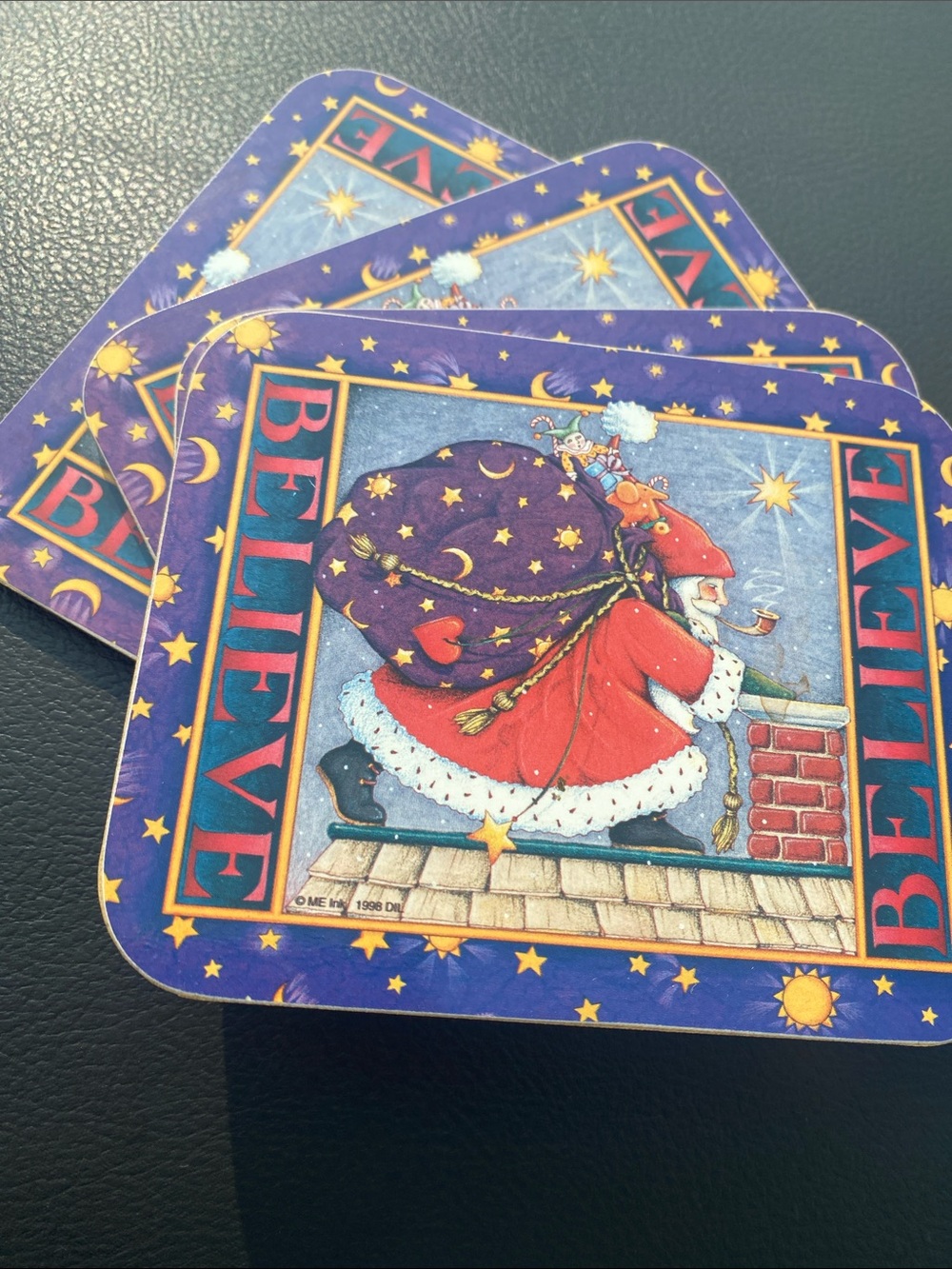 Believe set of 4 same scene Santa 🧑‍🎄 Coasters - Festive Purple and Red Holiday